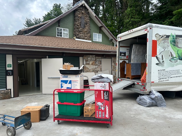 Helping a customer unload their rental truck into the climate control unit